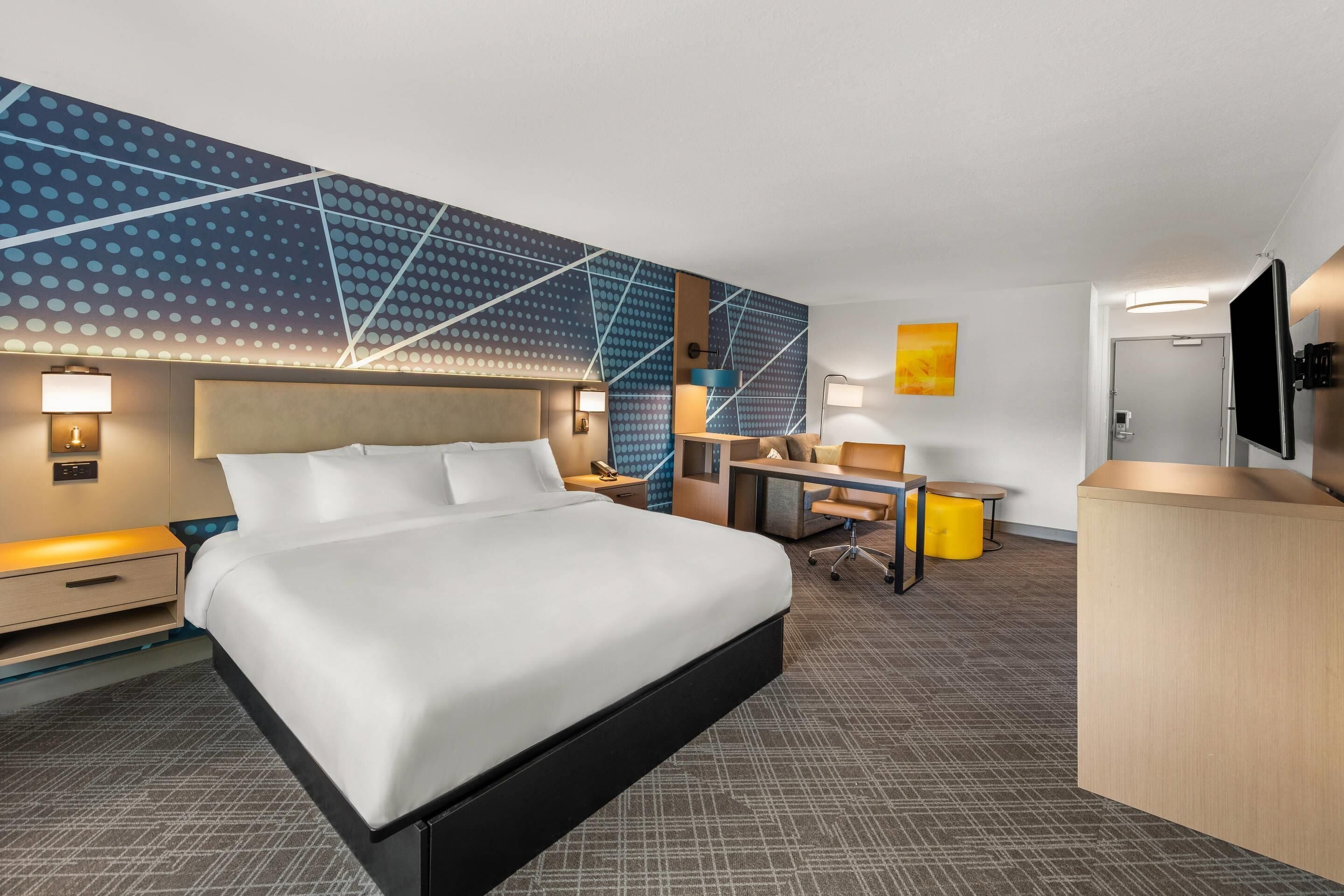 suite, 1 king bed with sofa bed, non smoking | desk, laptop workspace, blackout curtains, iron/ironing board