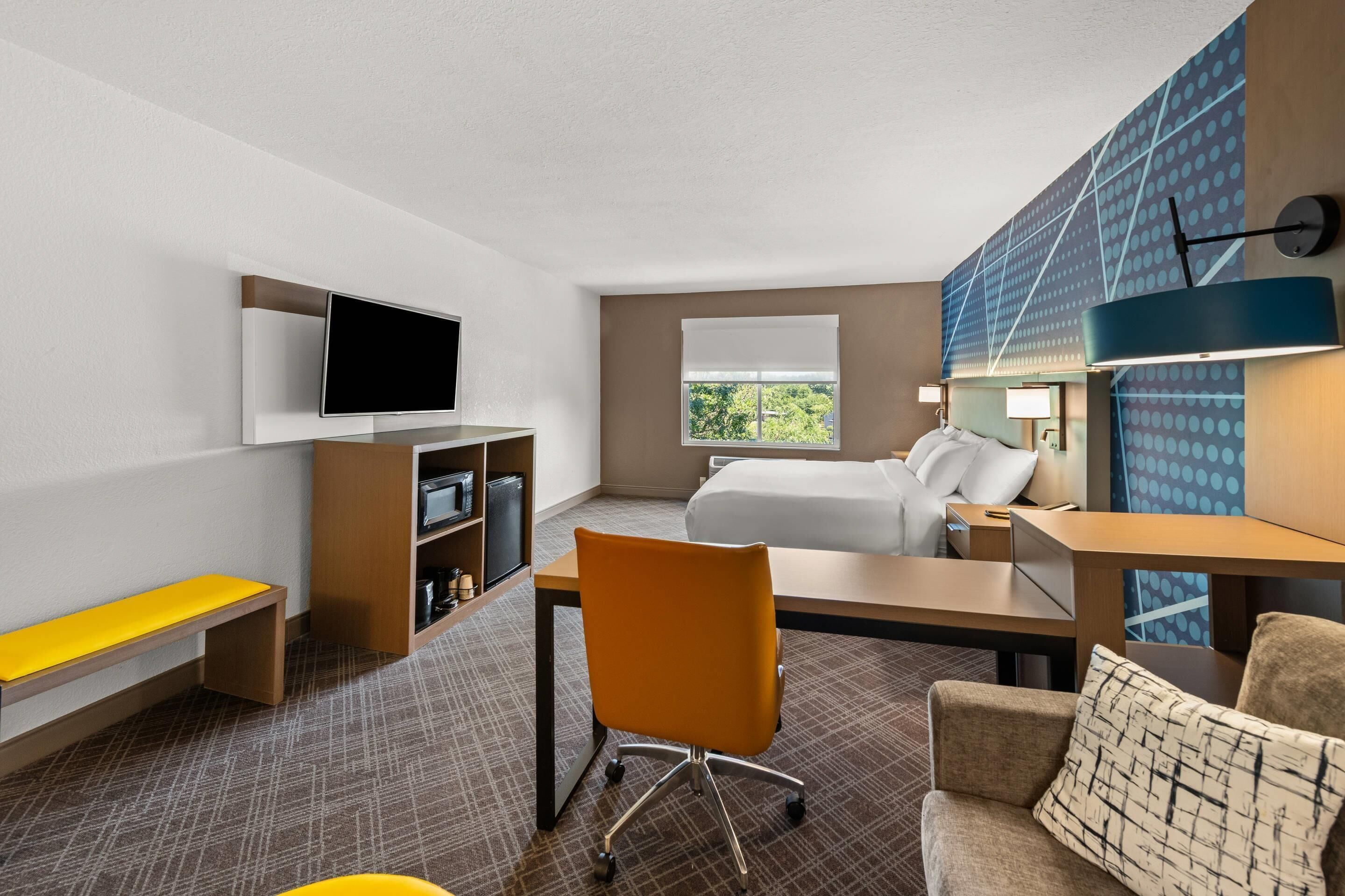 suite, 1 king bed with sofa bed, non smoking | desk, laptop workspace, blackout curtains, iron/ironing board