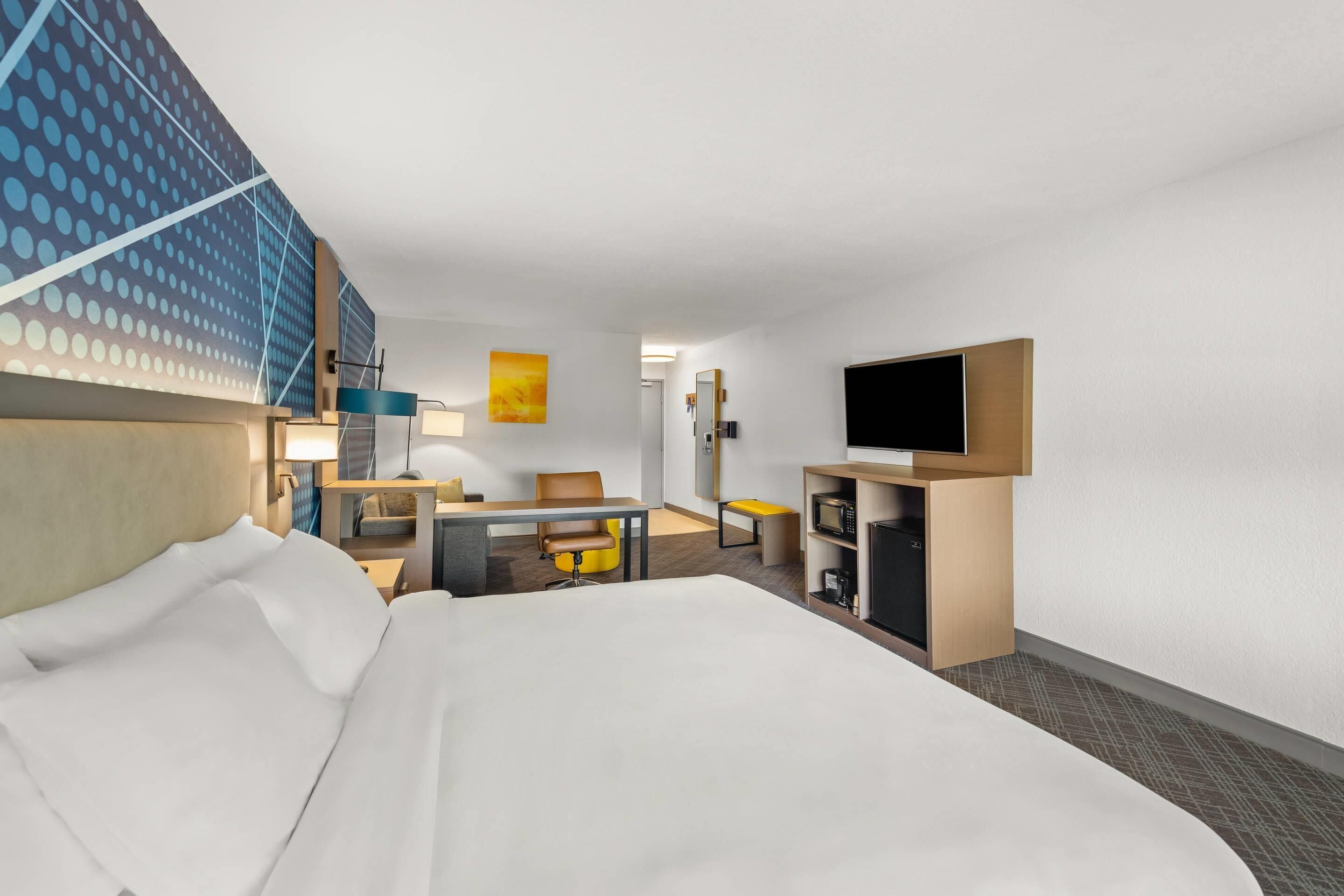 suite, 1 king bed with sofa bed, non smoking | desk, laptop workspace, blackout curtains, iron/ironing board