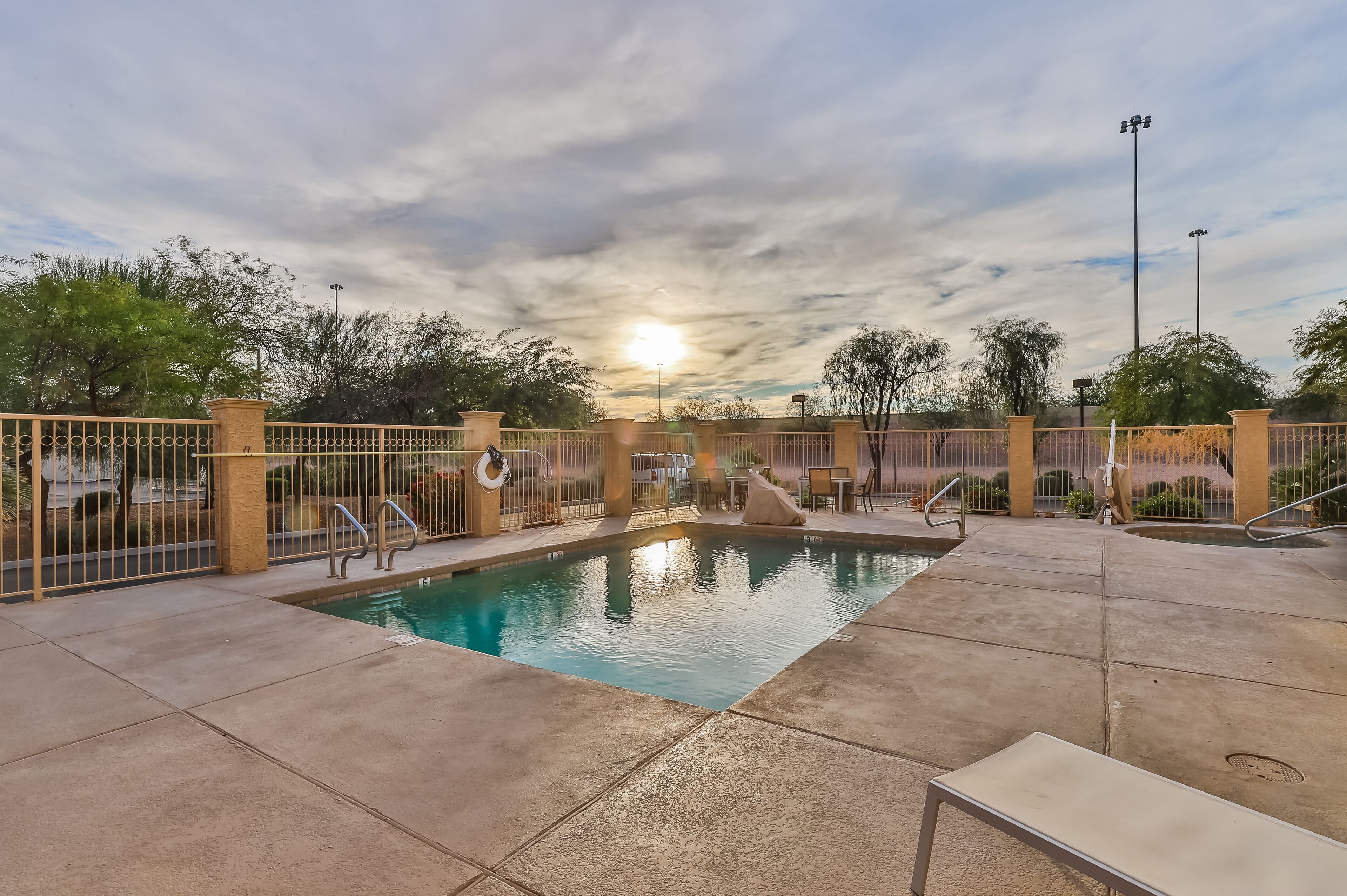 Outdoor pool, open 6:00 AM to 10:00 PM, pool umbrellas, sun loungers