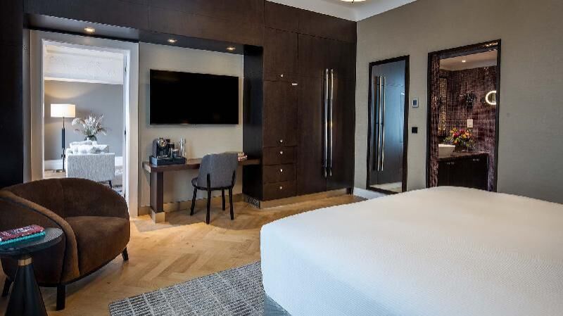 Premium bedding, down comforters, minibar, in-room safe