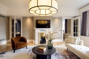 Suíte presidencial, 1 cama King | Área de estar | TV de tela plana