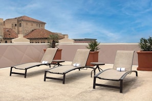 Outdoor pool, open 10:00 AM to 11:00 PM, sun loungers