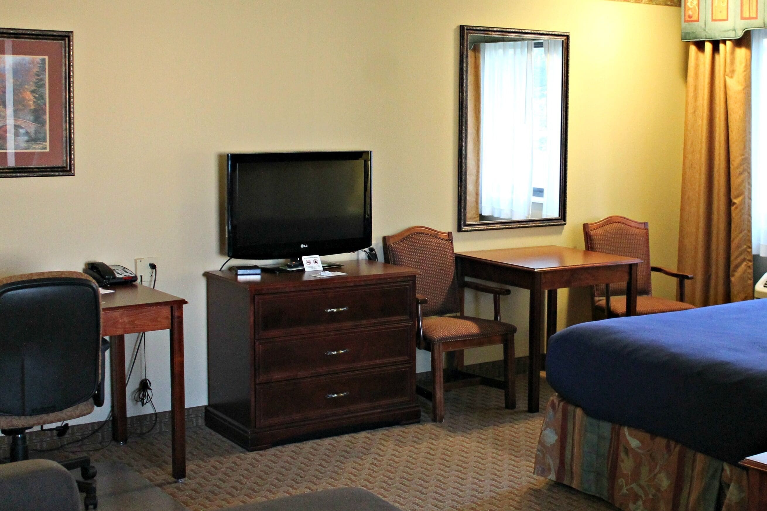 suite, 1 king bed with sofa bed, jetted tub | laptop workspace, blackout curtains, iron/ironing board, free wifi