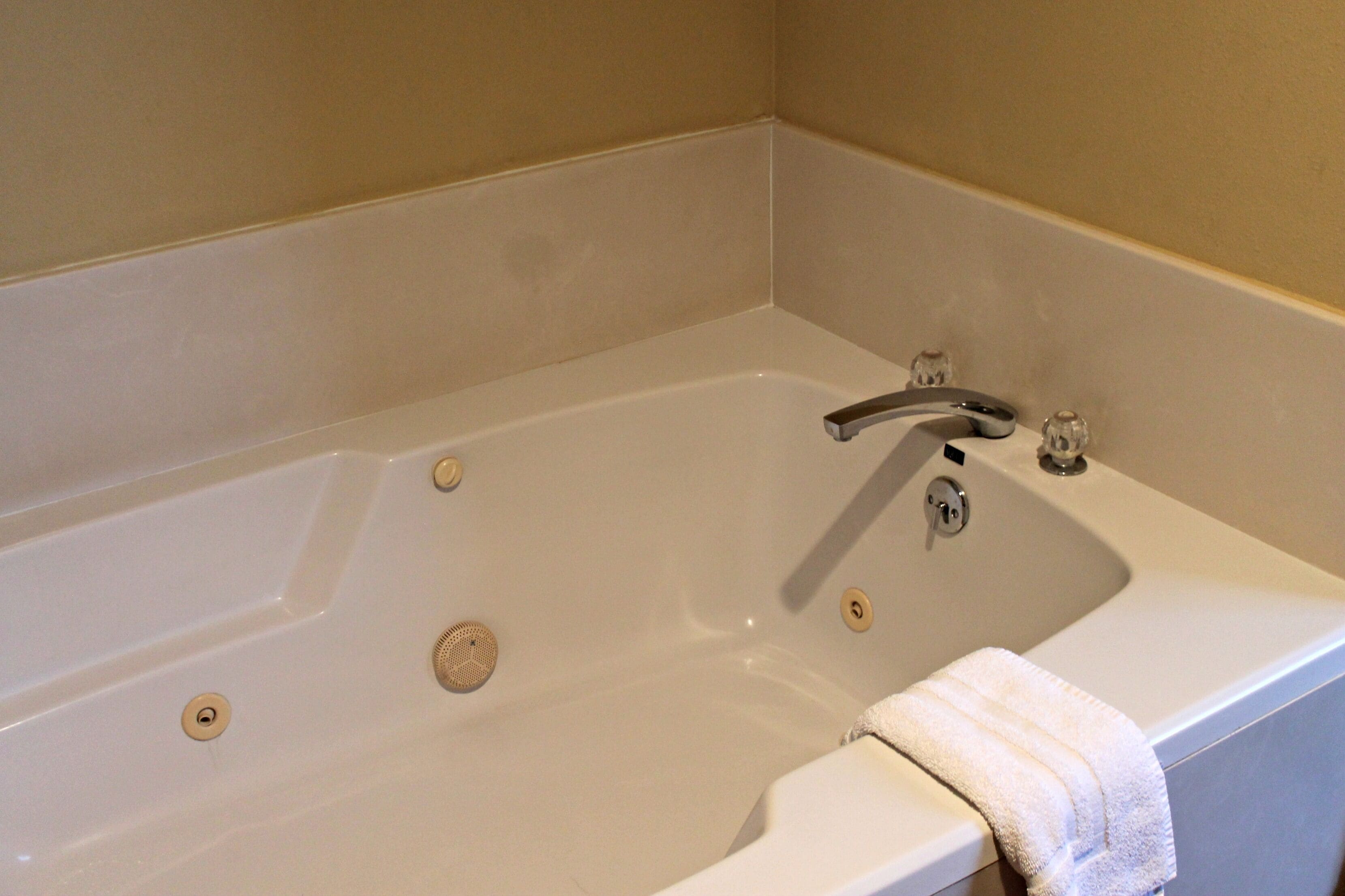 suite, 1 king bed with sofa bed, jetted tub | jetted bathtub