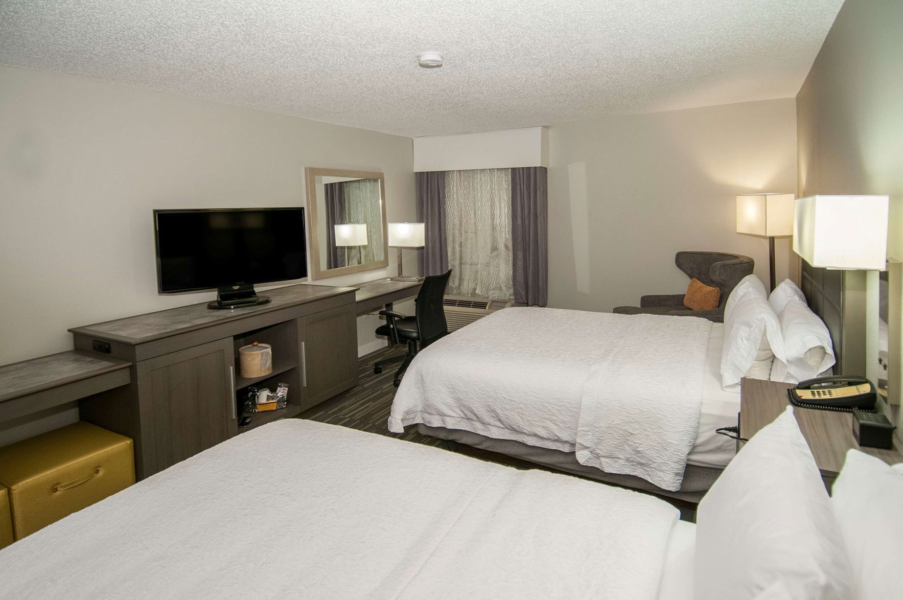 Premium bedding, desk, iron/ironing board, free cribs/infant beds