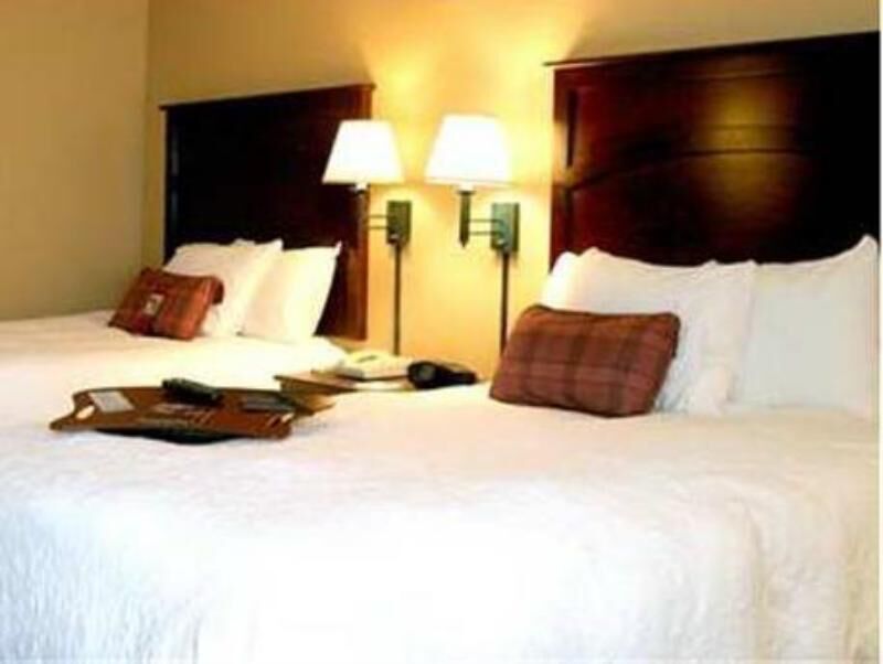 Premium bedding, desk, iron/ironing board, free cribs/infant beds