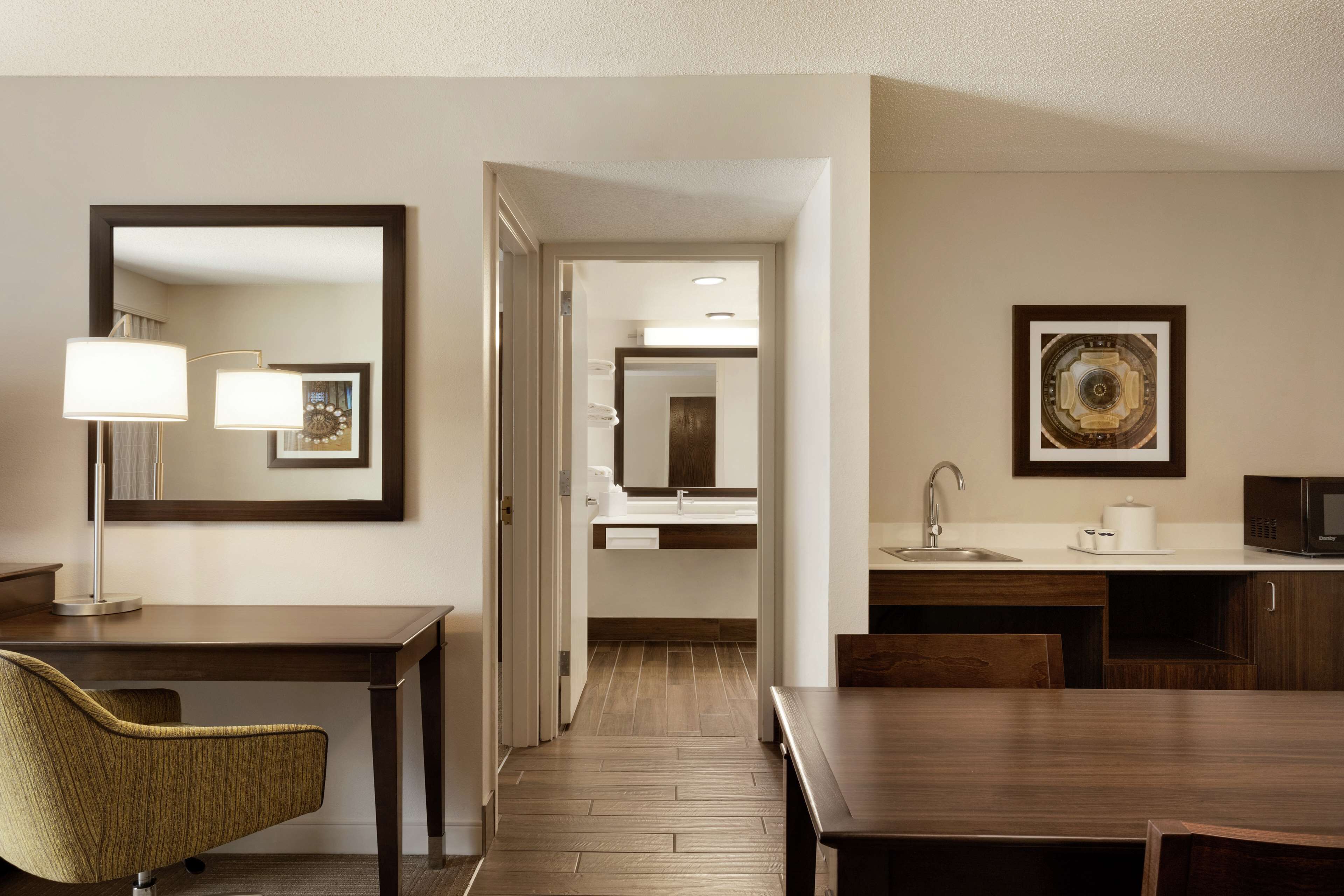 suite, 1 king bed, accessible, bathtub (mobility/hearing) | in-room safe, desk, iron/ironing board, free cots/infant beds
