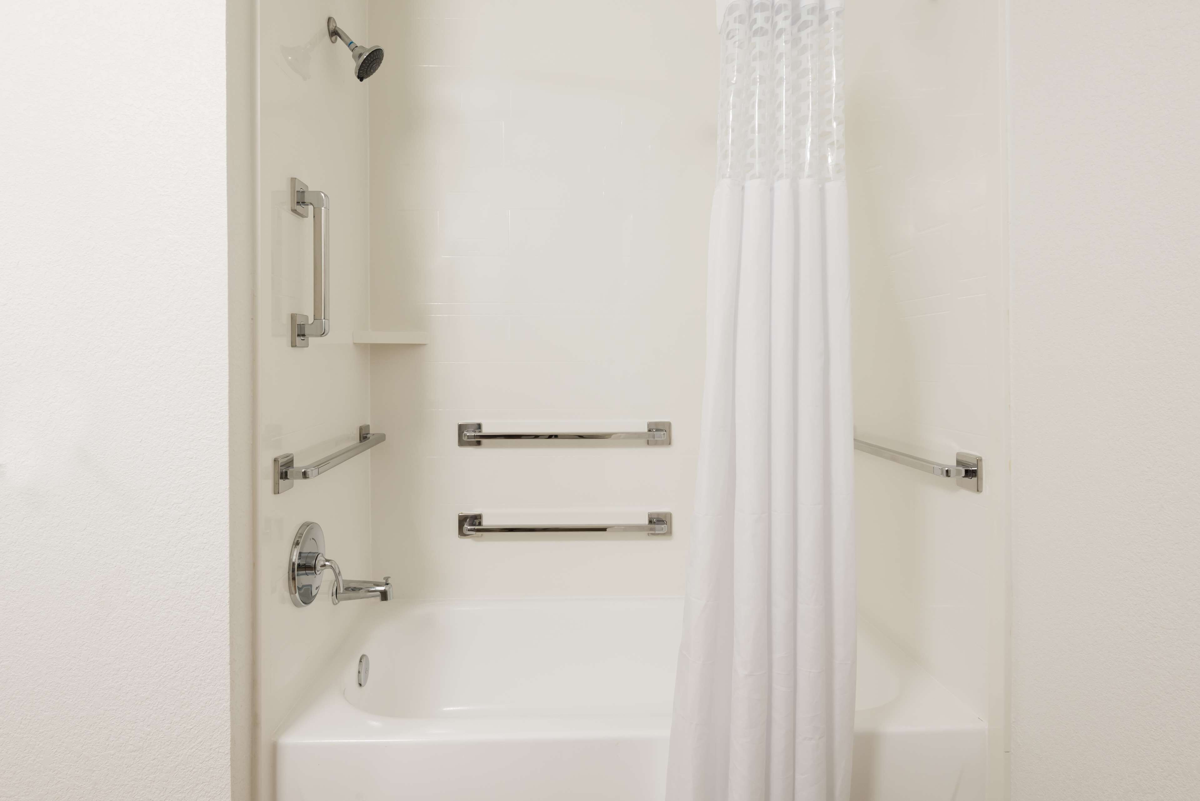 room, 1 king bed, accessible, bathtub | bathroom | combined shower/bathtub, deep-soaking bathtub, free toiletries, towels