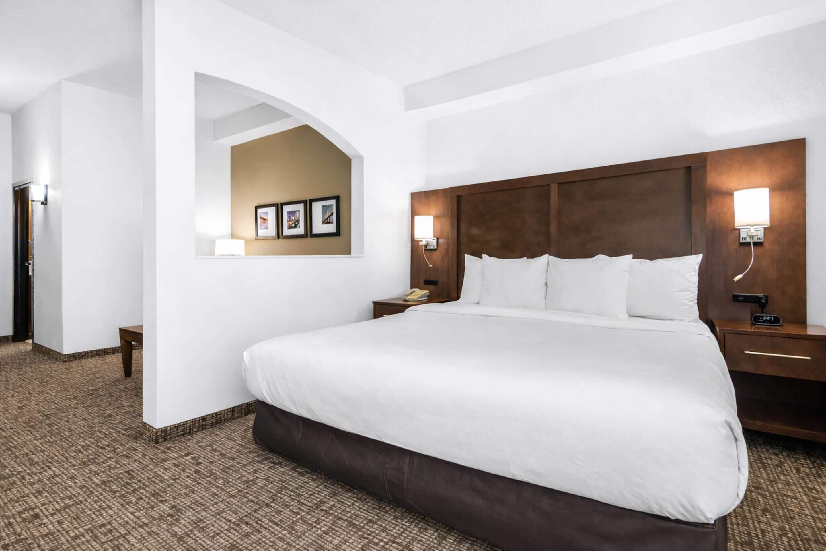 Deluxe Suite, Non Smoking | Desk, blackout drapes, iron/ironing board, free cribs/infant beds
