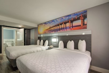 Room, 2 Double Beds, Non Smoking | In-room safe, blackout drapes, iron/ironing board, free WiFi at Clarion Pointe Tampa-Brandon Near Fairgrounds and Casino