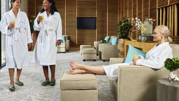 Relax in our serene lobby, featuring comfortable seating, a flat-screen TV, and a peaceful atmosphere.
