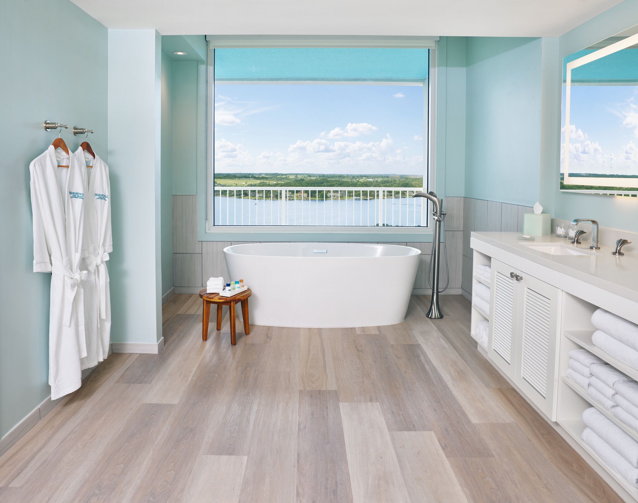 lake view presidential suite | bathroom | deep-soaking bathtub, designer toiletries, hair dryer, bathrobes