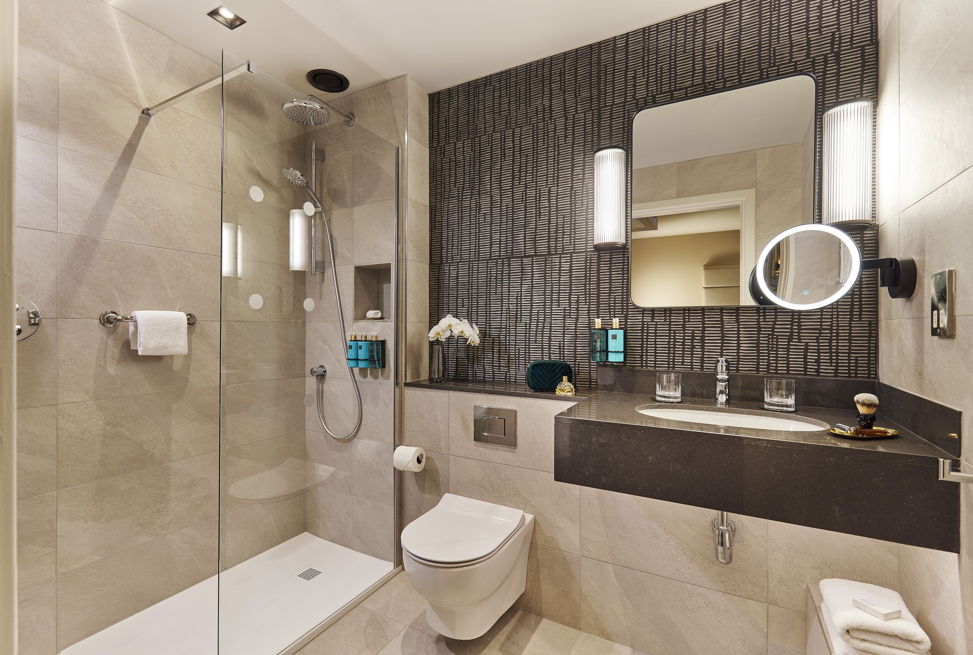 shower, eco-friendly toiletries, hair dryer, towels