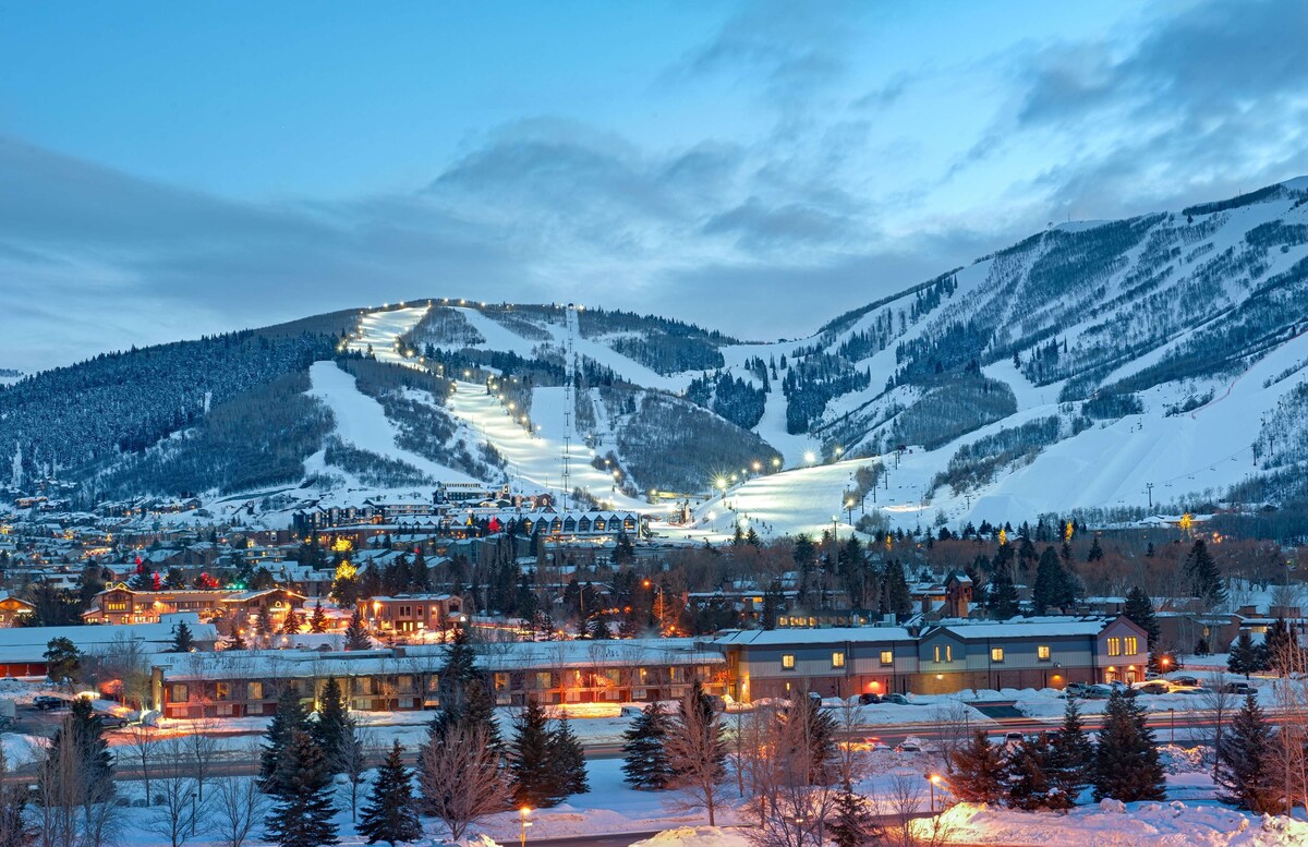 Exterior of the Doubtree by Hilton Hotel Park City-The Yarrow with view of the snow covered trails in the background