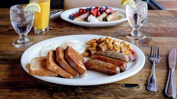 Daily cooked-to-order breakfast (USD 20 per person)