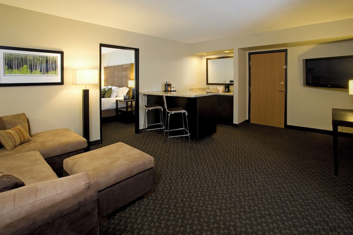 Premium bedding, pillow-top beds, desk, laptop workspace