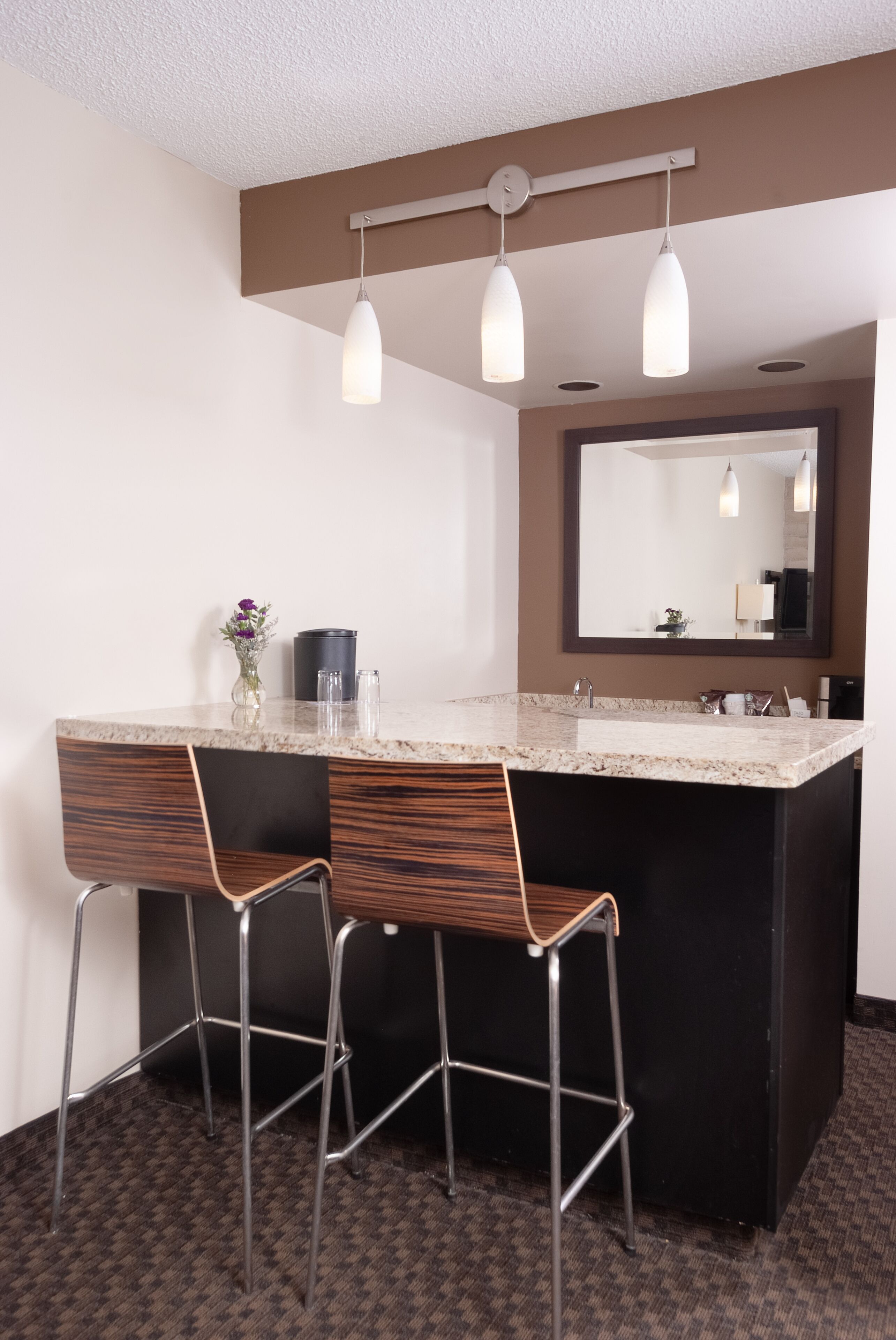 premium bedding, pillow-top beds, desk, laptop workspace