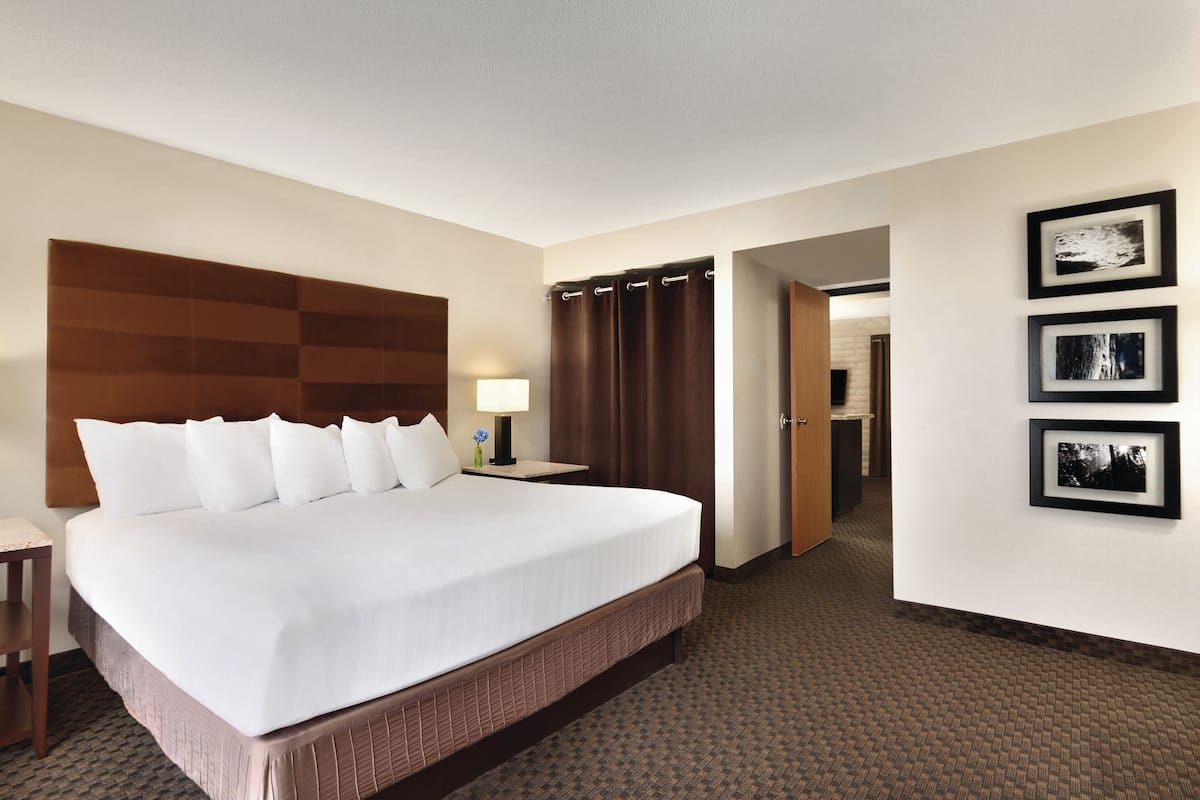 Premium bedding, pillow-top beds, desk, laptop workspace