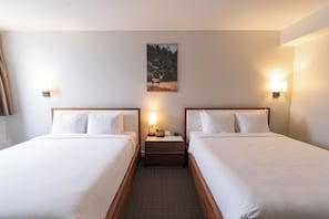 Deluxe Room, 2 Queen Beds, City View | Premium bedding, iron/ironing board, free cots/infant beds, free WiFi