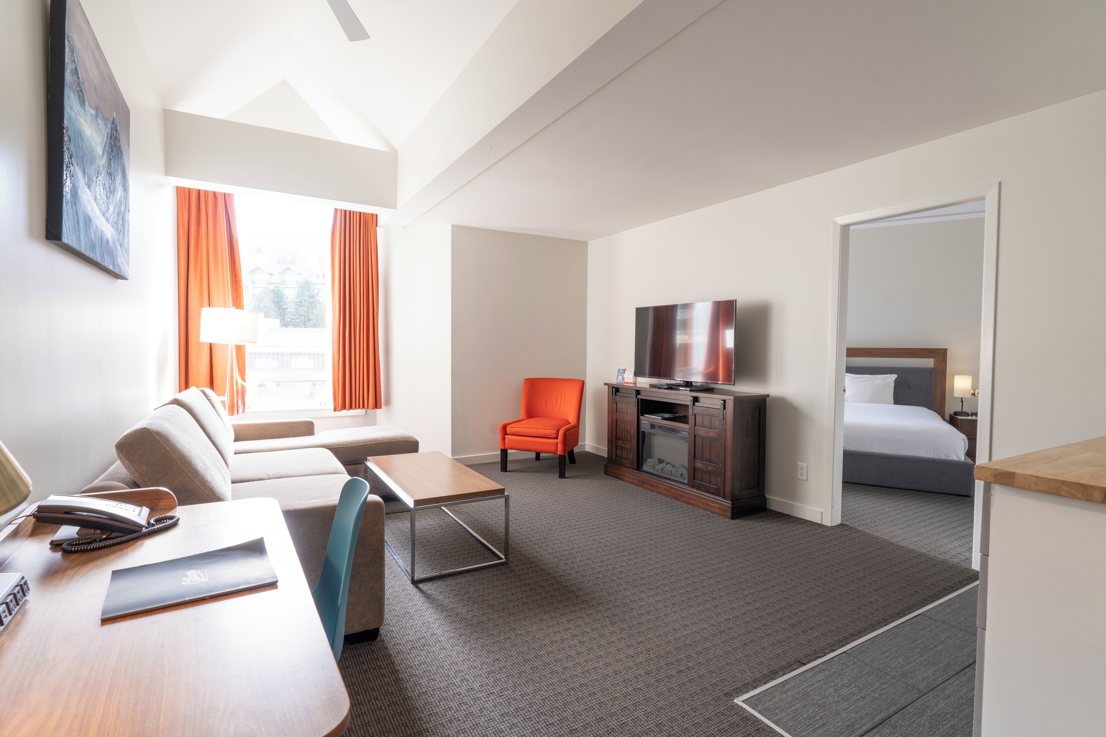 suite, 1 bedroom, fireplace, mountain view | living area | 50-inch flat-screen tv with digital channels, tv