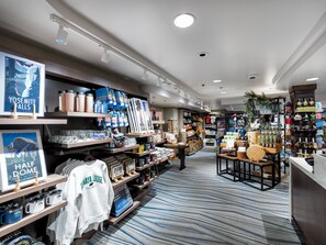 A retail store with shelves of various products, including clothing and home goods.