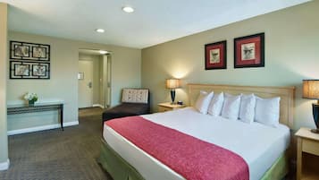 Premium bedding, desk, laptop workspace, iron/ironing board