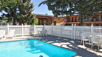 Seasonal outdoor pool, pool umbrellas, sun loungers