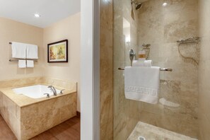 Separate tub and shower, deep soaking tub, designer toiletries