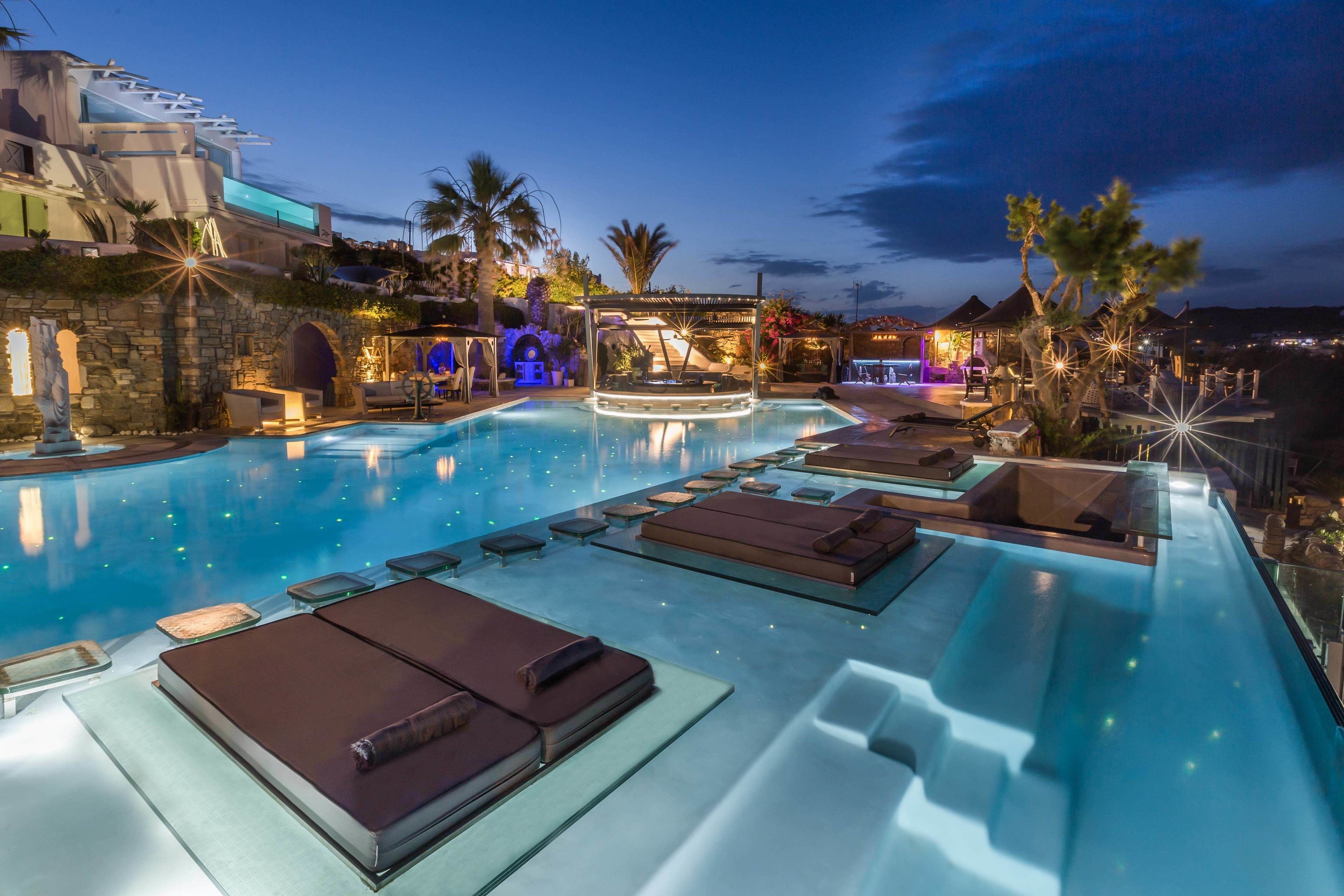 seasonal outdoor pool, pool umbrellas, pool loungers