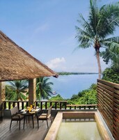 Rainforest Seaview Villa | Living area | 55-inch TV with cable channels, DVD player
