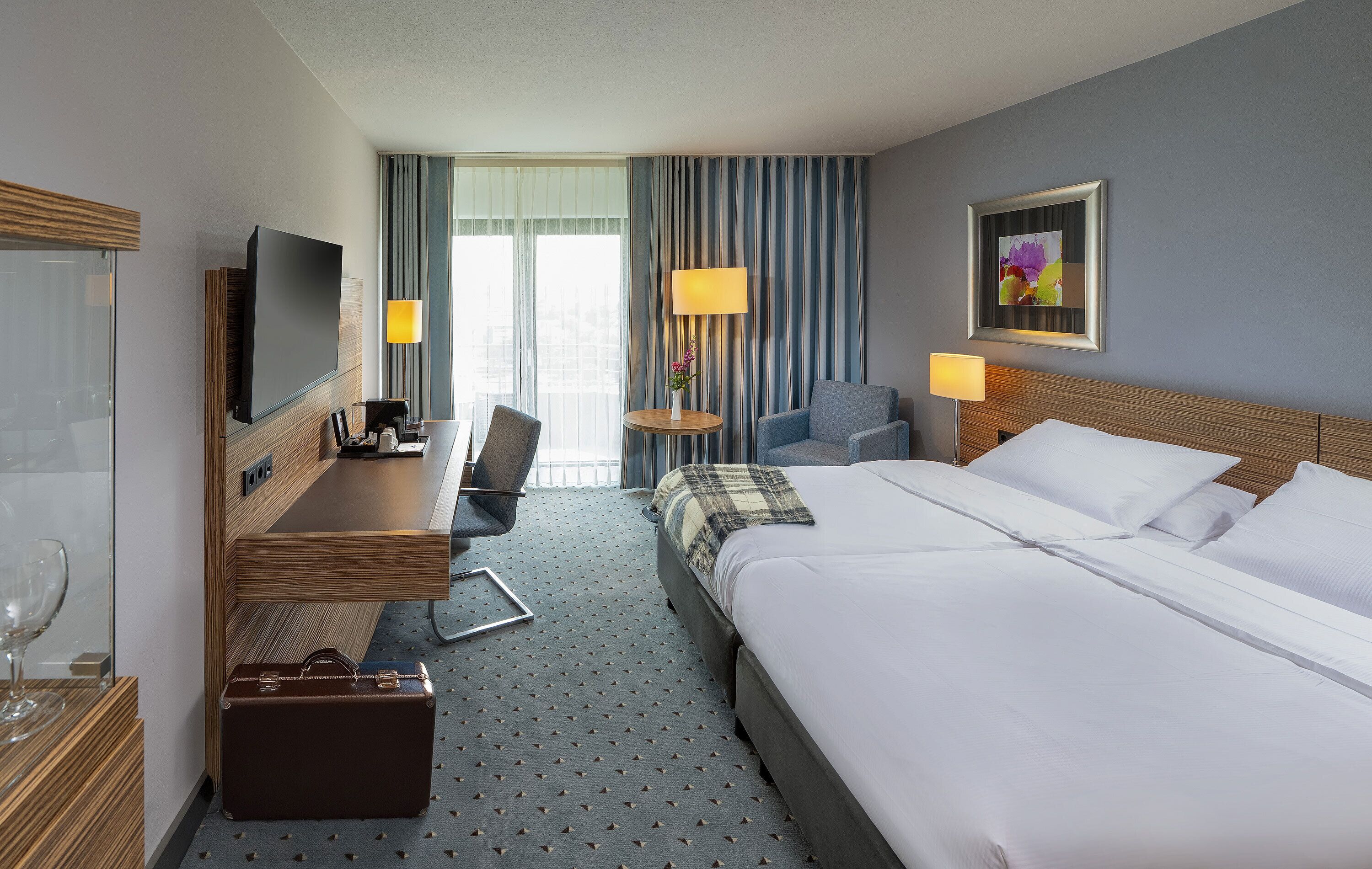 Hypo-allergenic bedding, in-room safe, desk, blackout curtains