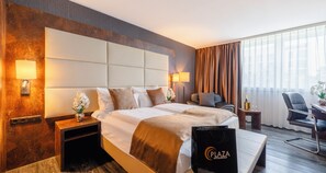 Hypoallergeen beddengoed, een minibar, een kluis op de kamer