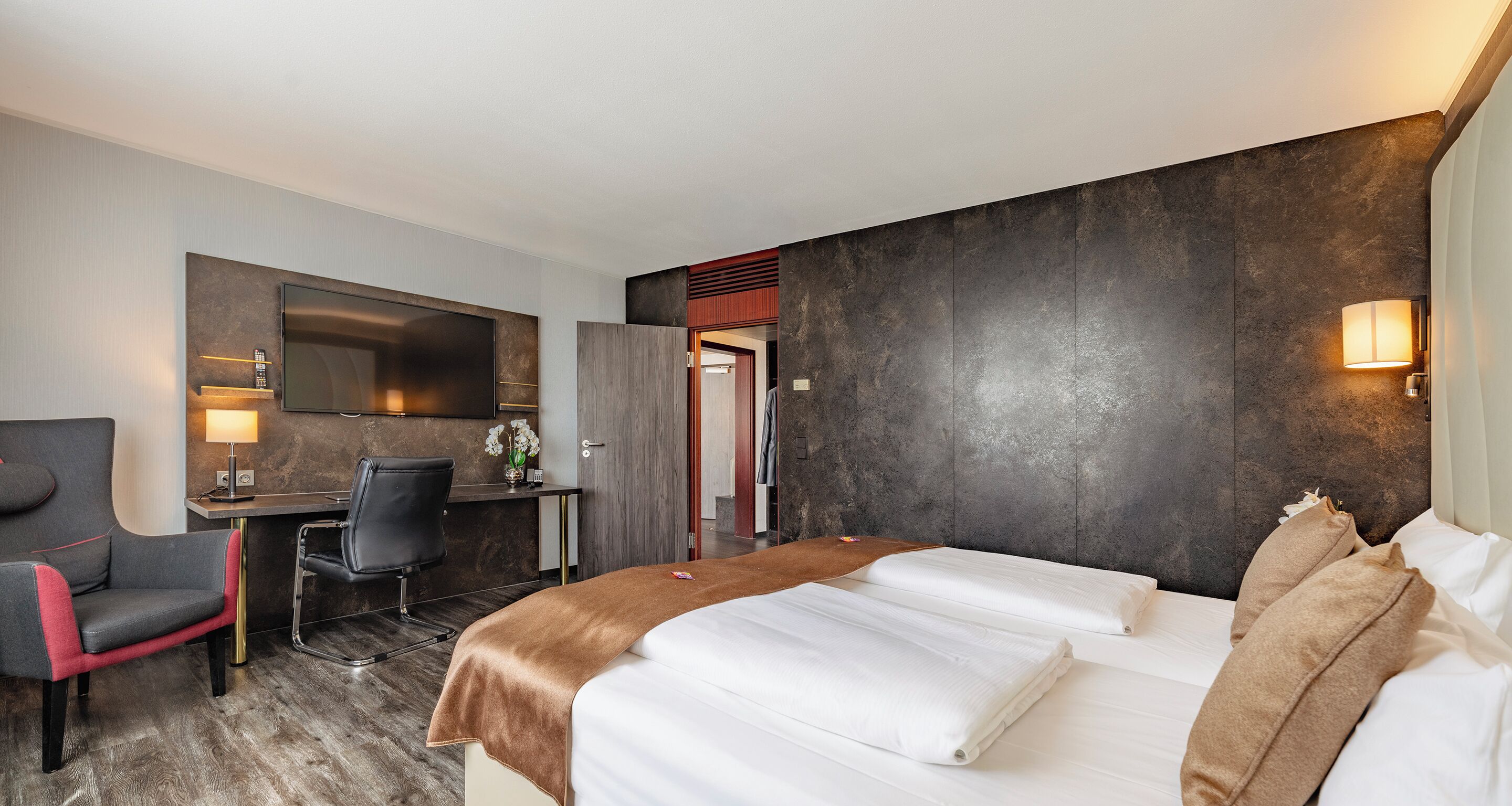 Suite | Ropa de cama hipoalergénica y minibar 