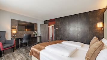 Suite | Ropa de cama hipoalergénica y minibar