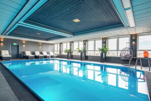 Indoor pool, open 3:00 PM to 10:00 PM, pool loungers