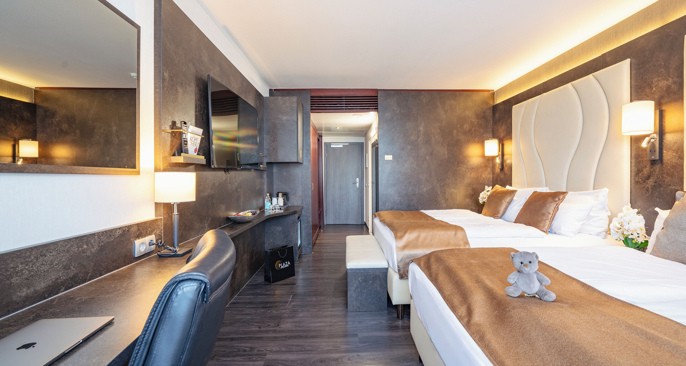 Literie hypoallergénique, minibar, coffres-forts dans les chambres