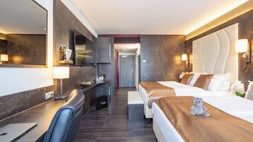 Literie hypoallergénique, minibar, coffres-forts dans les chambres