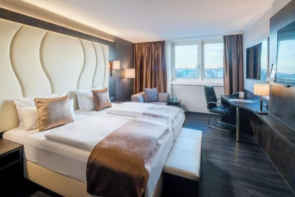 Literie hypoallergénique, minibar, coffres-forts dans les chambres