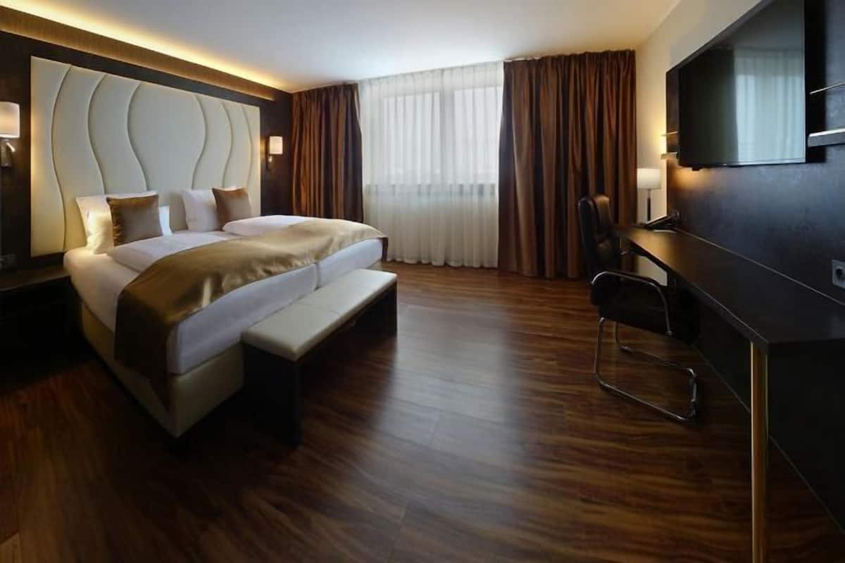 Literie hypoallergénique, minibar, coffres-forts dans les chambres