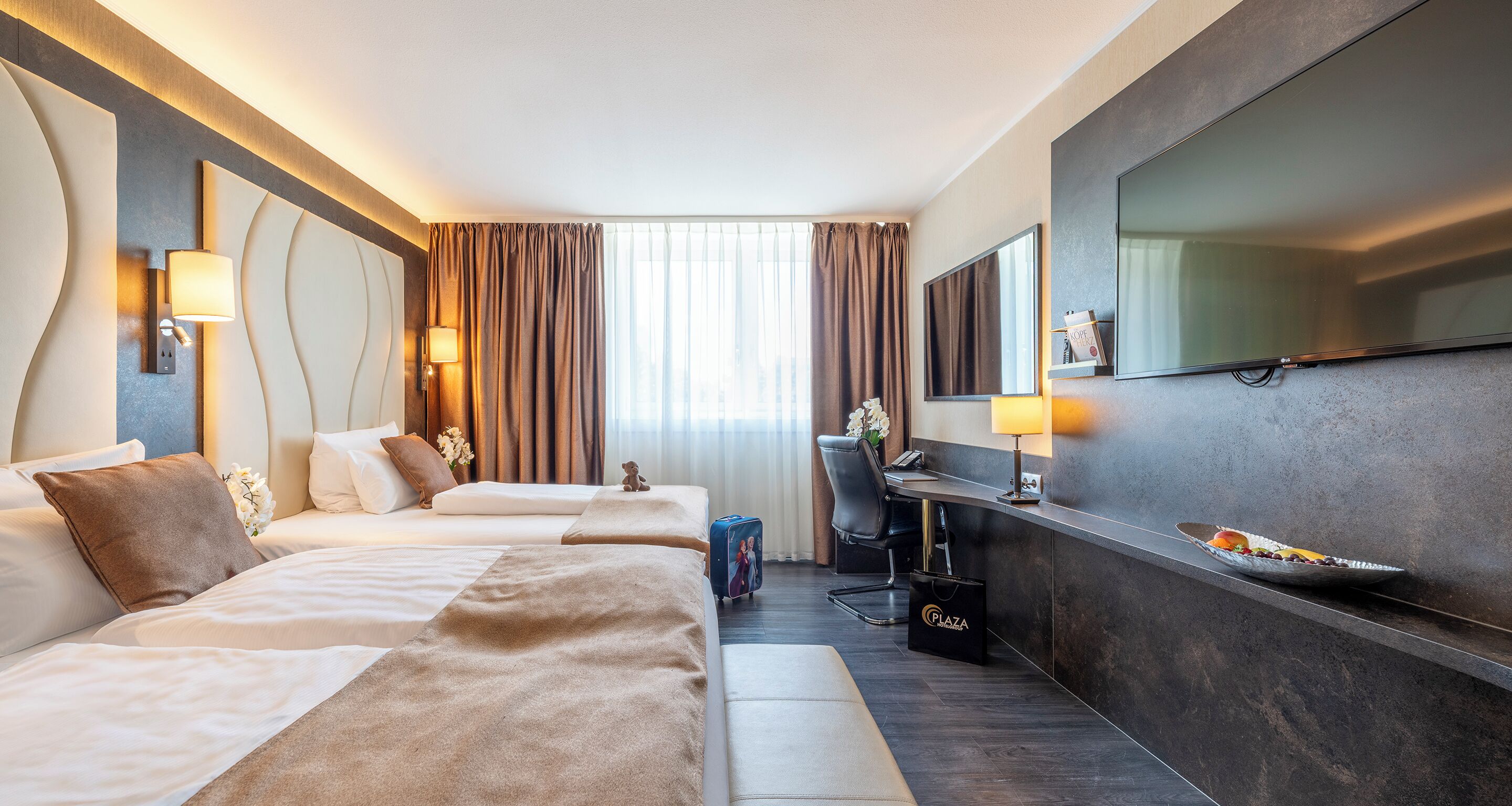 Literie hypoallergénique, minibar, coffres-forts dans les chambres