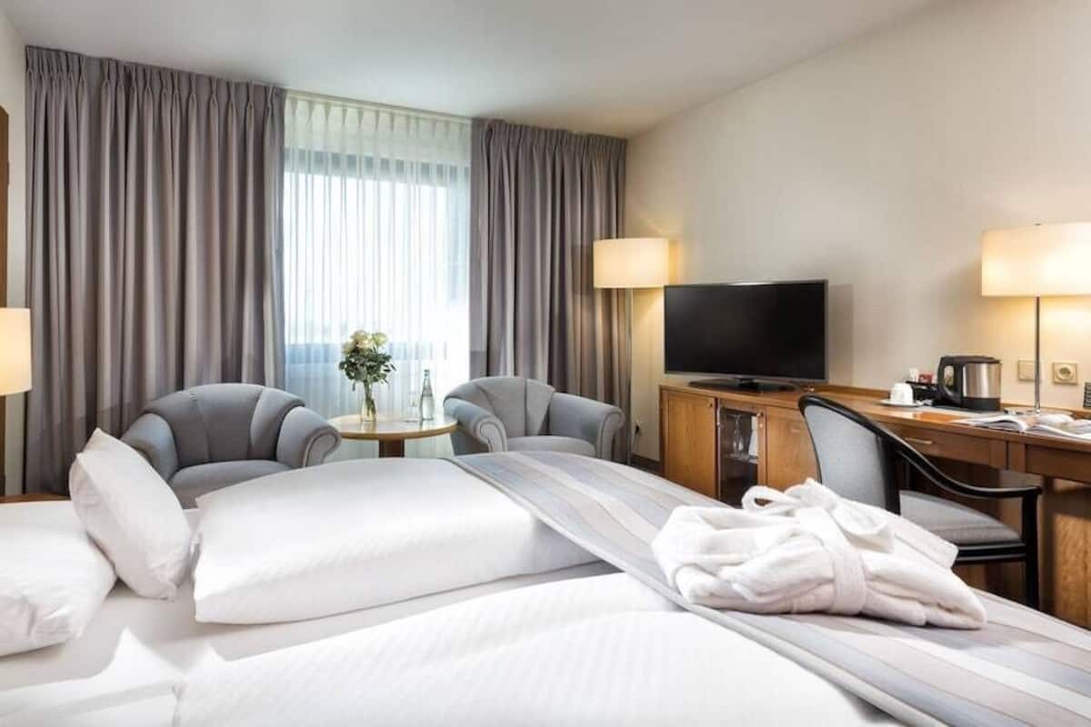 Hypo-allergenic bedding, in-room safe, desk, soundproofing