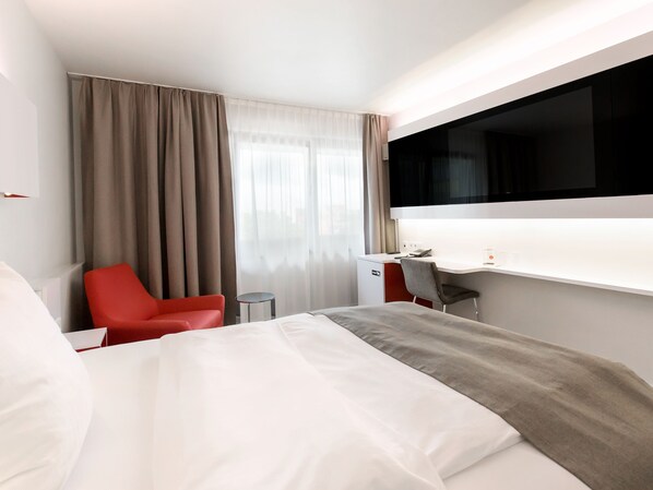 Comfort Double or Twin Room | 1 bedroom, hypo-allergenic bedding, free minibar items, in-room safe