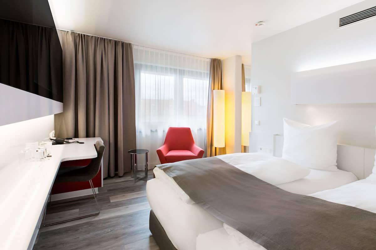 Camera Deluxe con letto matrimoniale o 2 letti singoli | Biancheria da letto ipoallergenica
