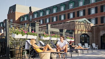 Indoor pool, pool umbrellas, pool loungers