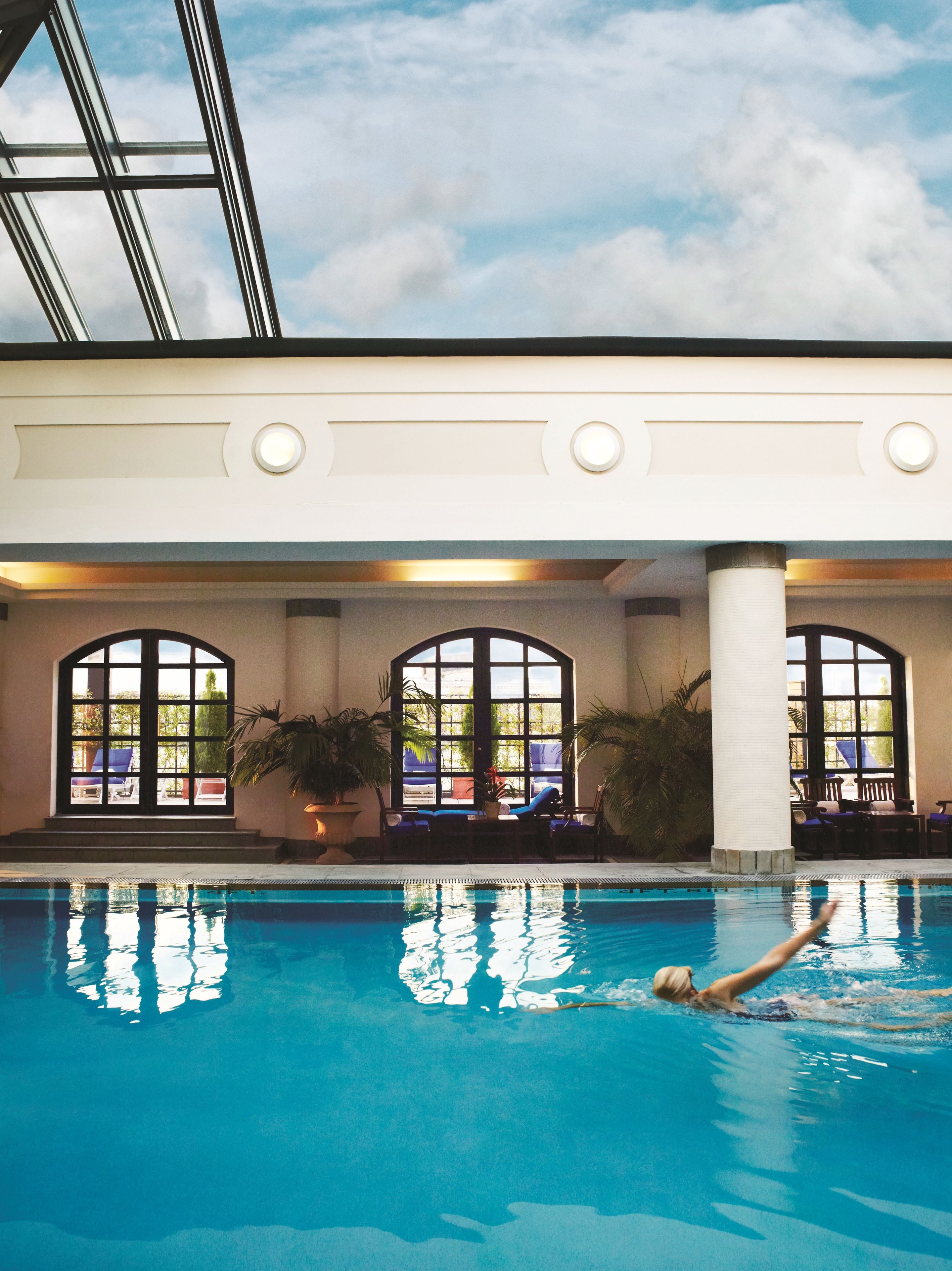 indoor pool, pool umbrellas, pool loungers