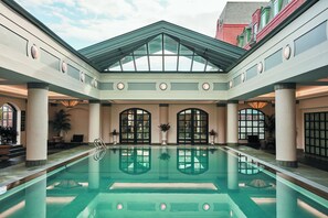 Indoor pool, pool umbrellas, pool loungers