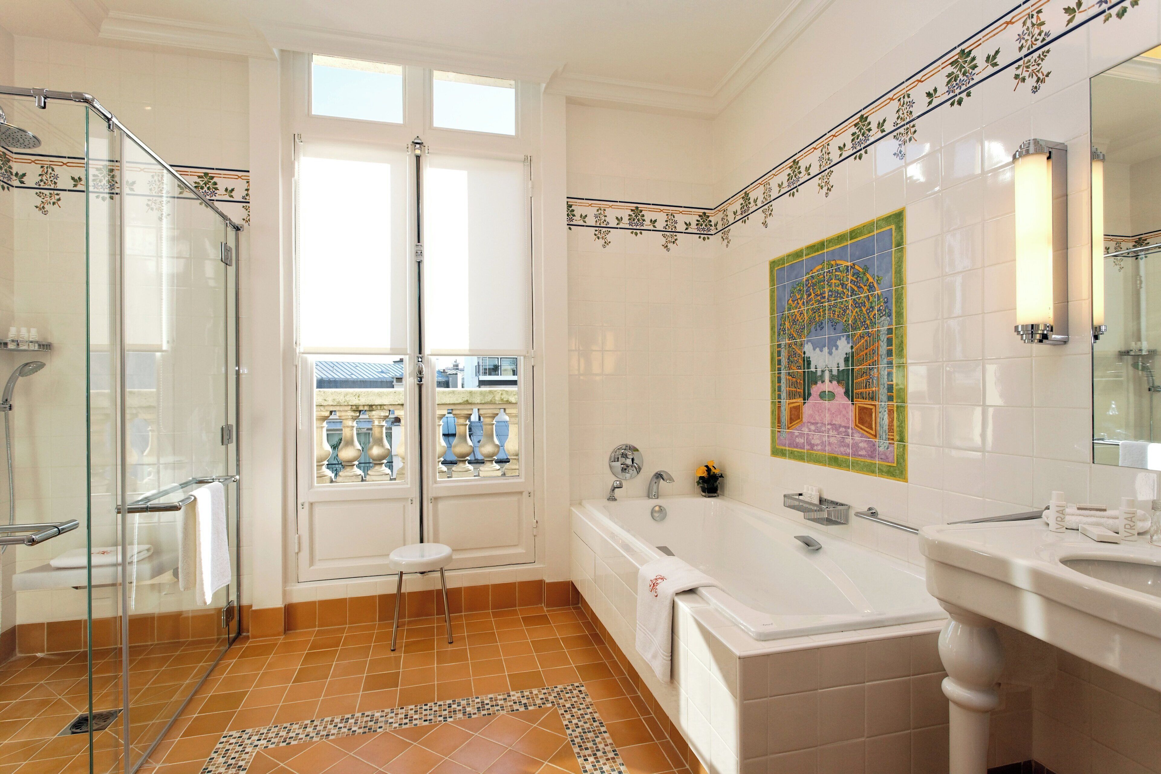 designer toiletries, hair dryer, bathrobes, slippers