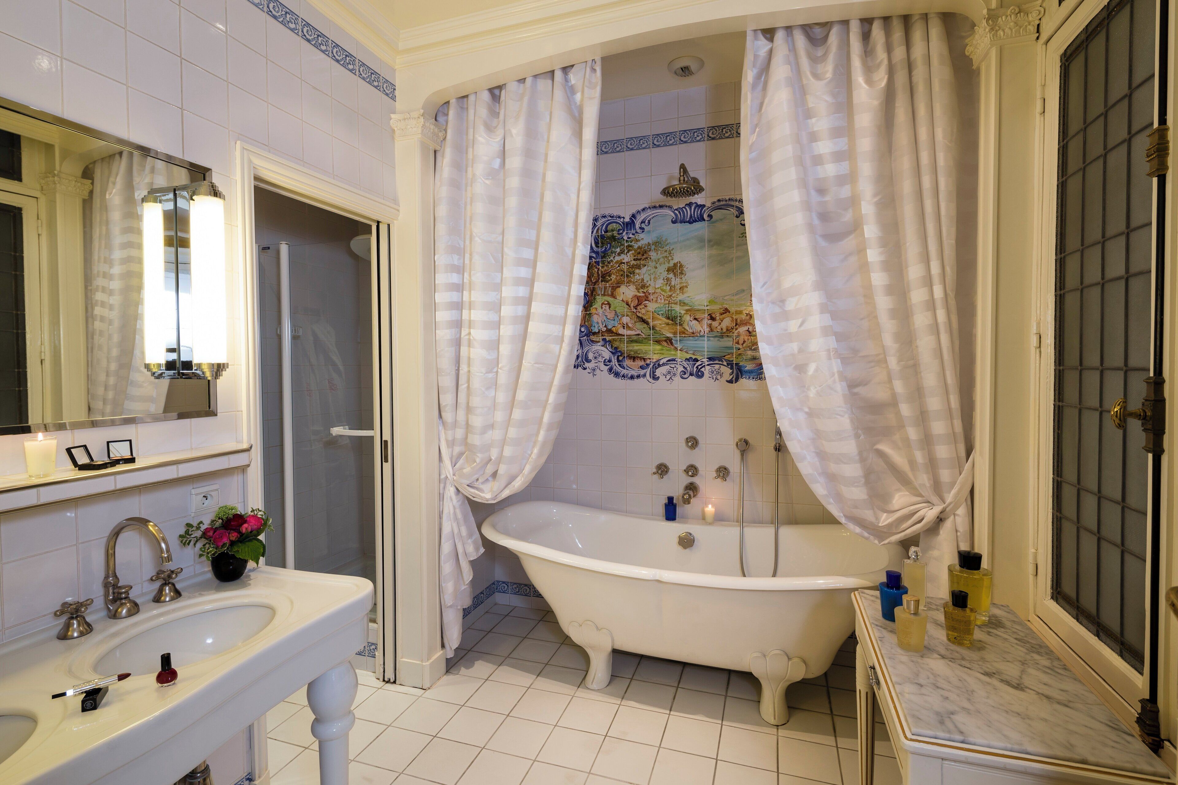 junior suite | bathroom | designer toiletries, hair dryer, bathrobes, slippers