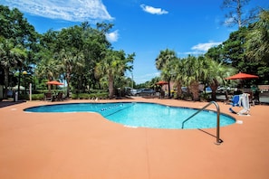 Seasonal outdoor pool, open 9:00 AM to 10:00 PM, pool umbrellas